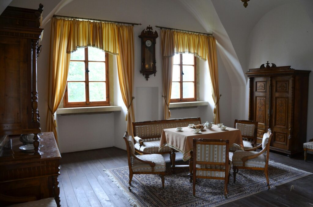 Traditional dining room with antique wooden furniture and classic interior décor