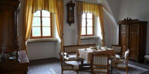 Traditional dining room with antique wooden furniture and classic interior décor
